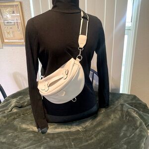 Escorting crossbody/sling/belt purse